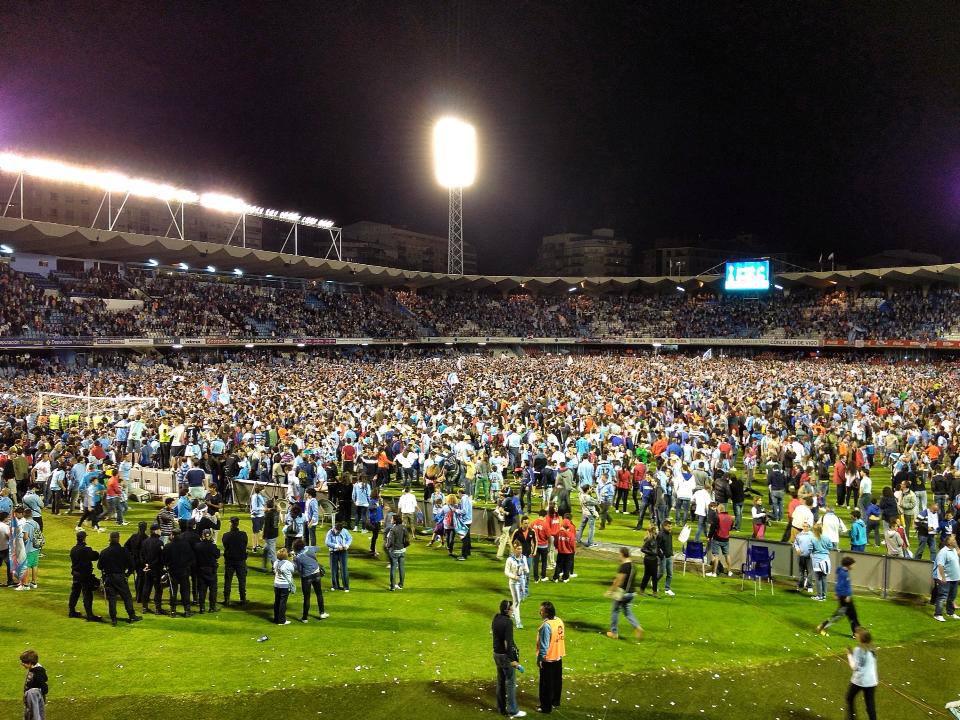 Celta fans flood the pitch after winning Saturday to secure two things: their own survival and Deportivo's doom. Machiavellian, really. 